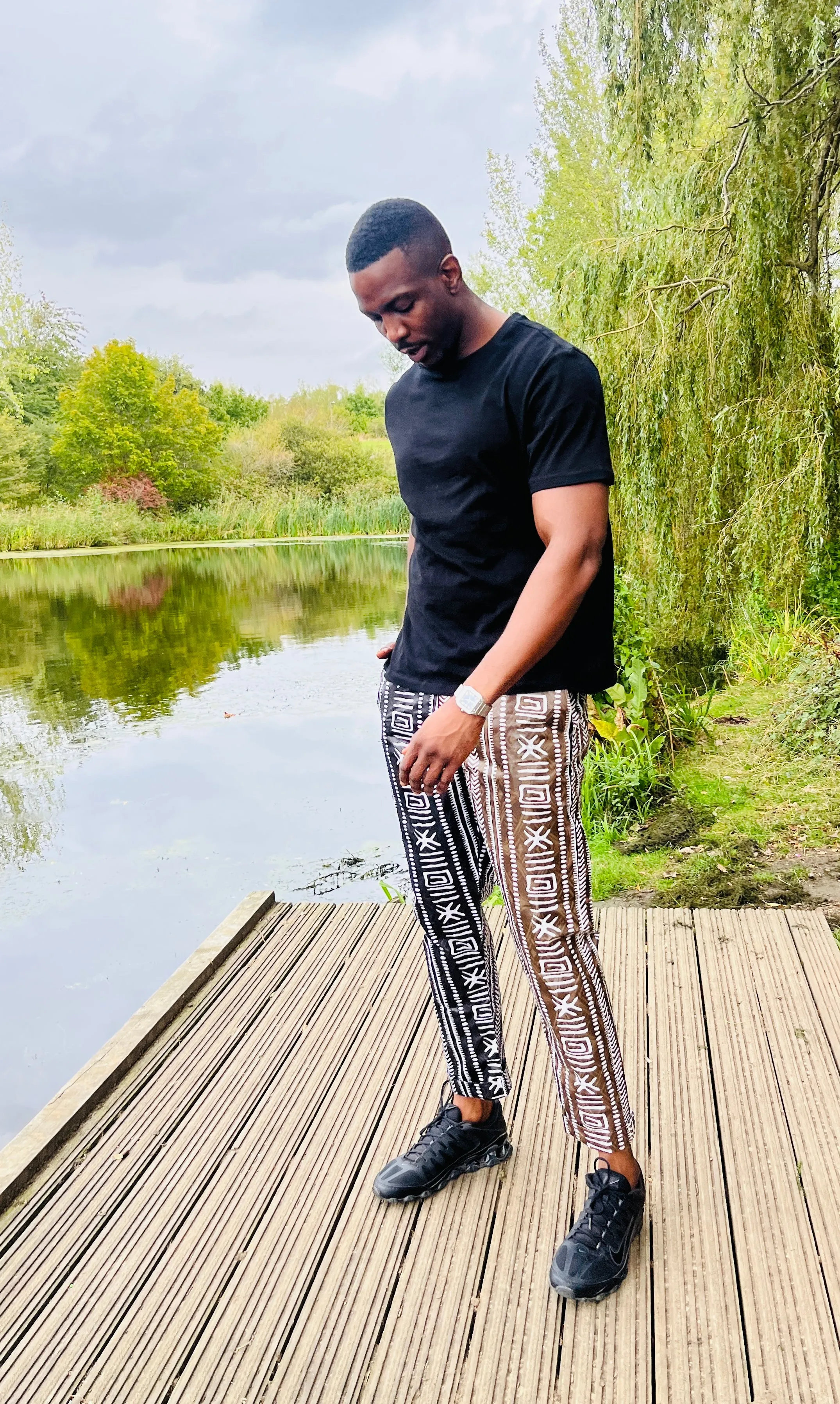 The Zembe Men Ankara African Print Slim Fit Trousers Pants in Black Brown Mud Cloth by Eldimaa Fashion